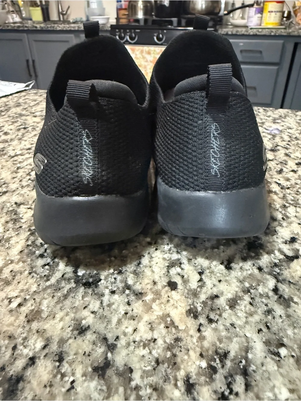 Skechers Men's All-Black Slip-On Knit Sneakers